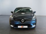 the front view of a blue car parked in a showroom