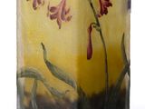 a candle that has a picture of a flower on it