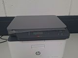 an image of a printer sitting on top of a desk