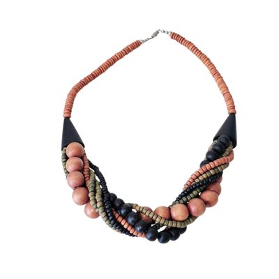 a close up of a necklace on a white background