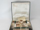 silver plated flatware set in a case with matching spoons and spoons