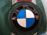 bmw emblem on the back of a green and red jacket