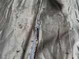 a piece of fabric that has been torn off of the jacket