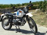 a motorcycle that is parked on the side of the road