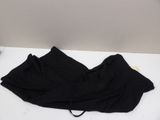the black underwear is laying on a white table