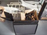 a box full of assorted items sitting on a table