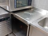 a microwave and a dishwasher in a small kitchen