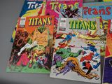 a lot of comic books sitting on a table