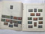 a lot of stamps on the pages of a book