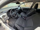 the interior of a car with black leather seats and a steering wheel