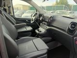 a view of a car ' s interior from the driver ' s seat