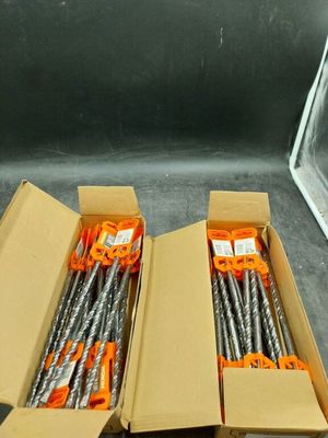 two boxes filled with different types of tools on a table