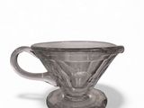 an image of a glass cup with a handle on a white background