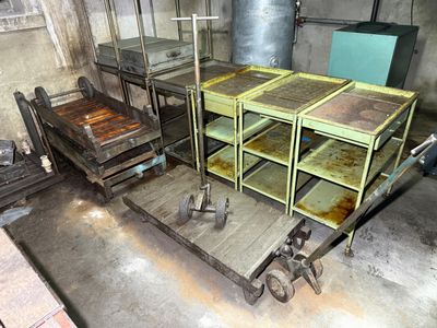 a room with a table and a cart in it