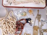 a box with many different types of jewelry in it
