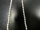 a close up of a necklace on a mannequin mannequin