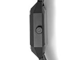 the back of a watch on a white surface with a white background