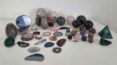many different types of stones on the table
