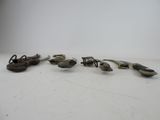 five pairs of shoes that are sitting on a table