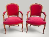 pair of louis xv style armchairs with red velvet upholstered seats