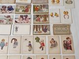 a lot of cards on the table with pictures on them