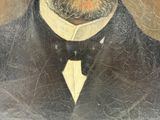 tableau représentant un homme barbu portant un nœud papillon
