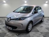 an image of a silver car in a showroom