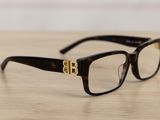 a close up of a pair of glasses on a table