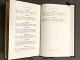 a book open to a page of text on a table