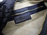 a close up of a purse with a zipper on it