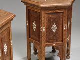 pair of carved wooden side tables with drawers and drawers