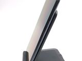 a cell phone that is sitting on top of a stand