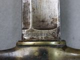 a close up of a knife on a table