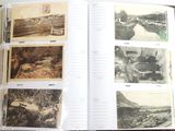 an open book with pictures on it on a table