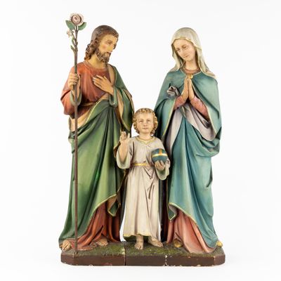 a statue of jesus, mary, and jesus with a child