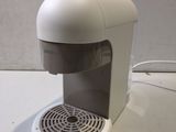 a coffee maker that is sitting on a table