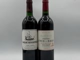 deux bouteilles de vin posées l'une à côté de l'autre sur une table