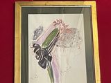 a picture of a painting on the wall next to a pair of scissors