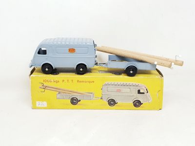 a toy truck with a crane on top of it in a box
