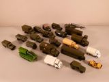 a lot of military vehicles and trucks on the table