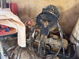 an image of a dirty room with a fan and other items