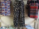 a display of clothing on a rack in a store