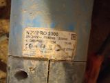 a close up of a metal pipe with a label on it