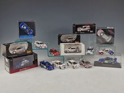 a lot of toy cars on display in a display case
