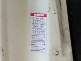 a sticker on the back of a car that is dirty