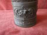 a large metal container with a design on it