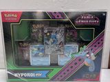 la boîte est ouverte sur la table, avec le jeu à l'intérieur