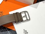 a watch that is sitting on top of an orange box