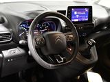 the interior of a car with a steering wheel, dashboard, and dash board