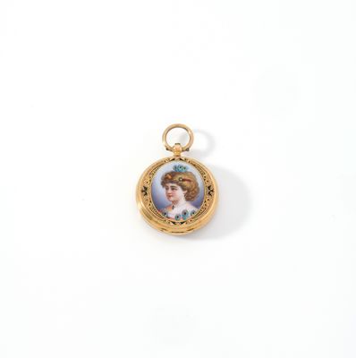 a close up of a small gold locke with a picture of a woman on it